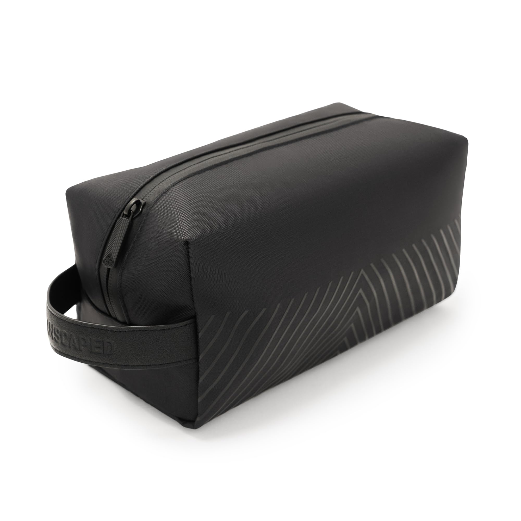 MANSCAPED front view showing compact organized toiletry bag benefit: travel-ready