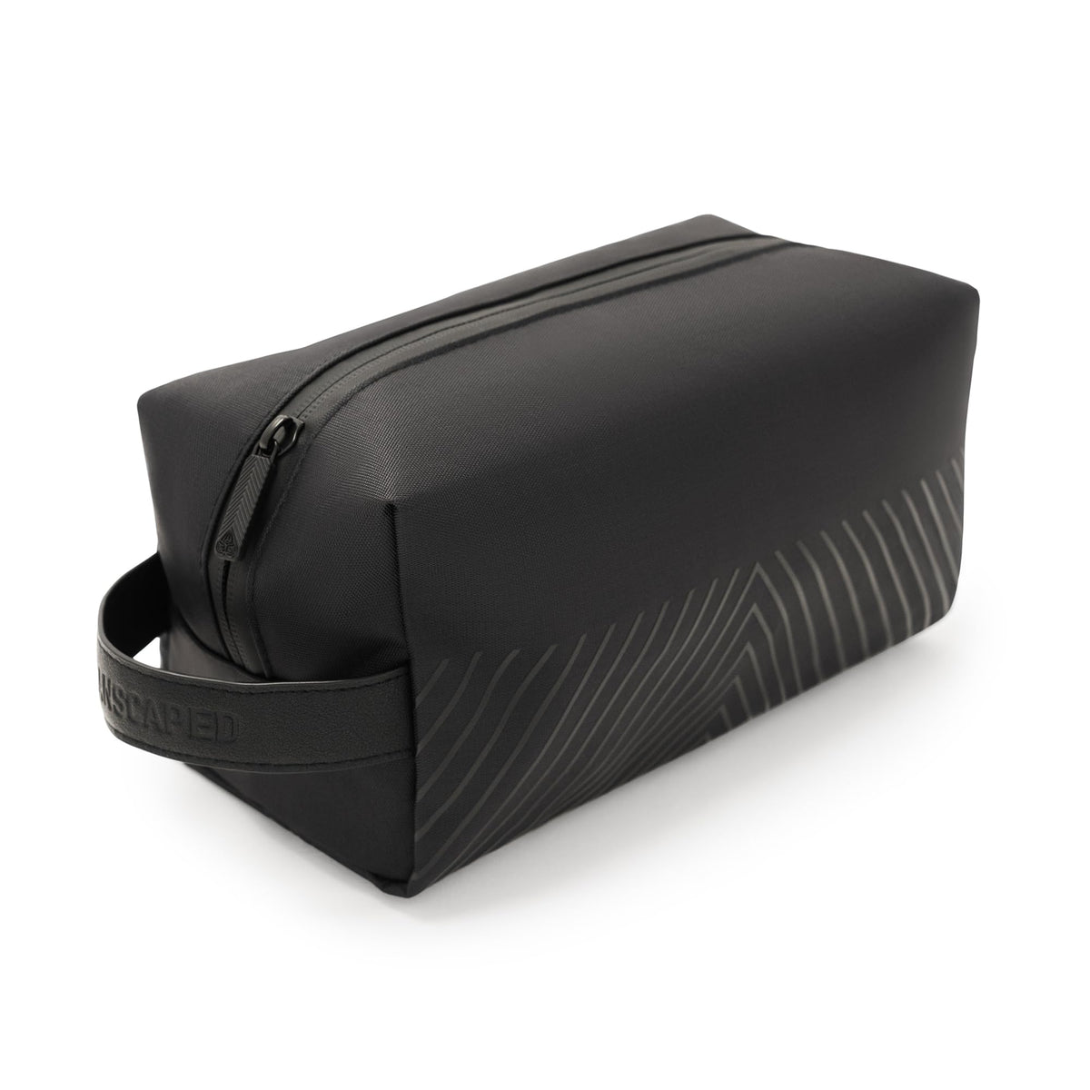MANSCAPED front view showing compact organized toiletry bag benefit: travel-ready