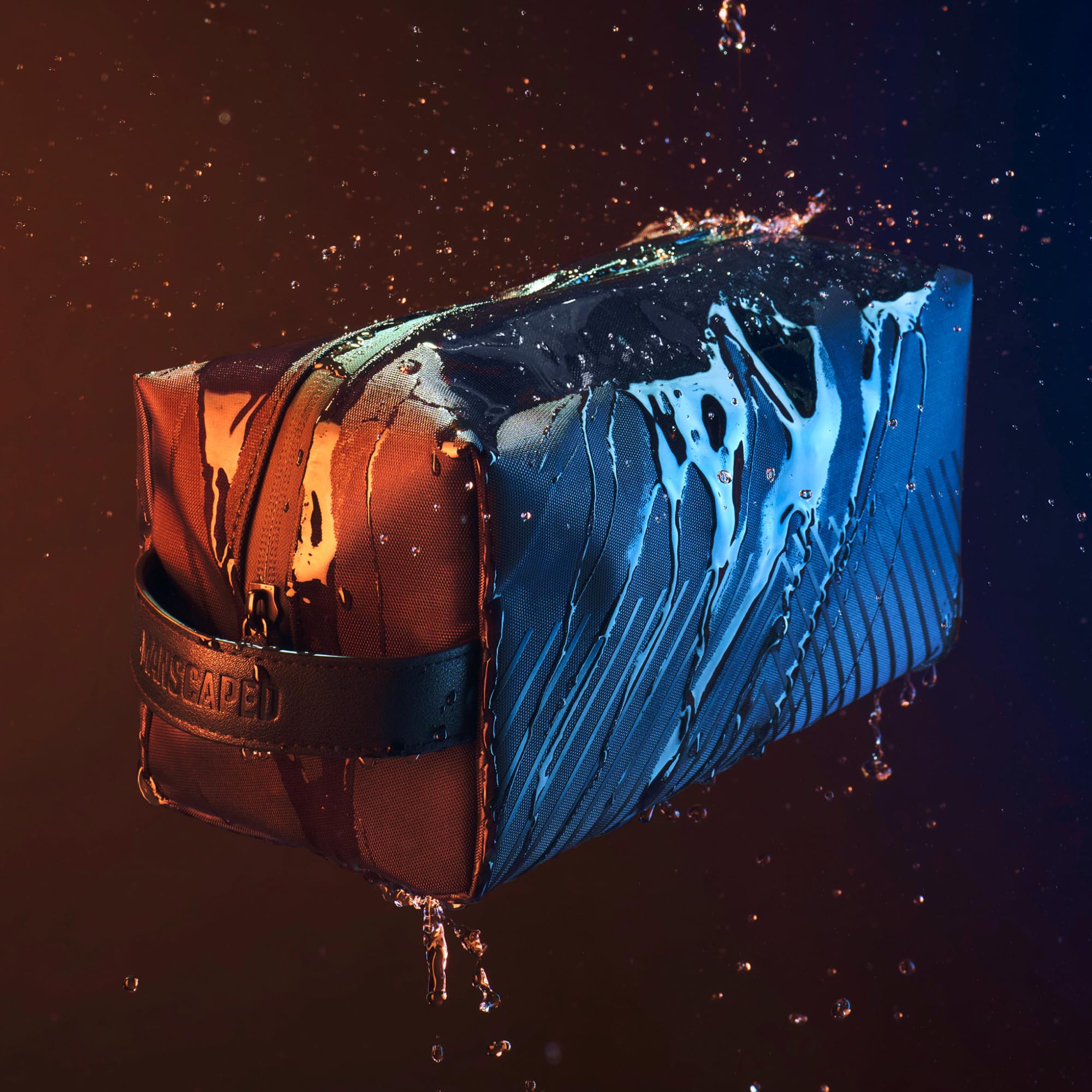 MANSCAPED water-resistant fabric demo protecting contents from spills benefit