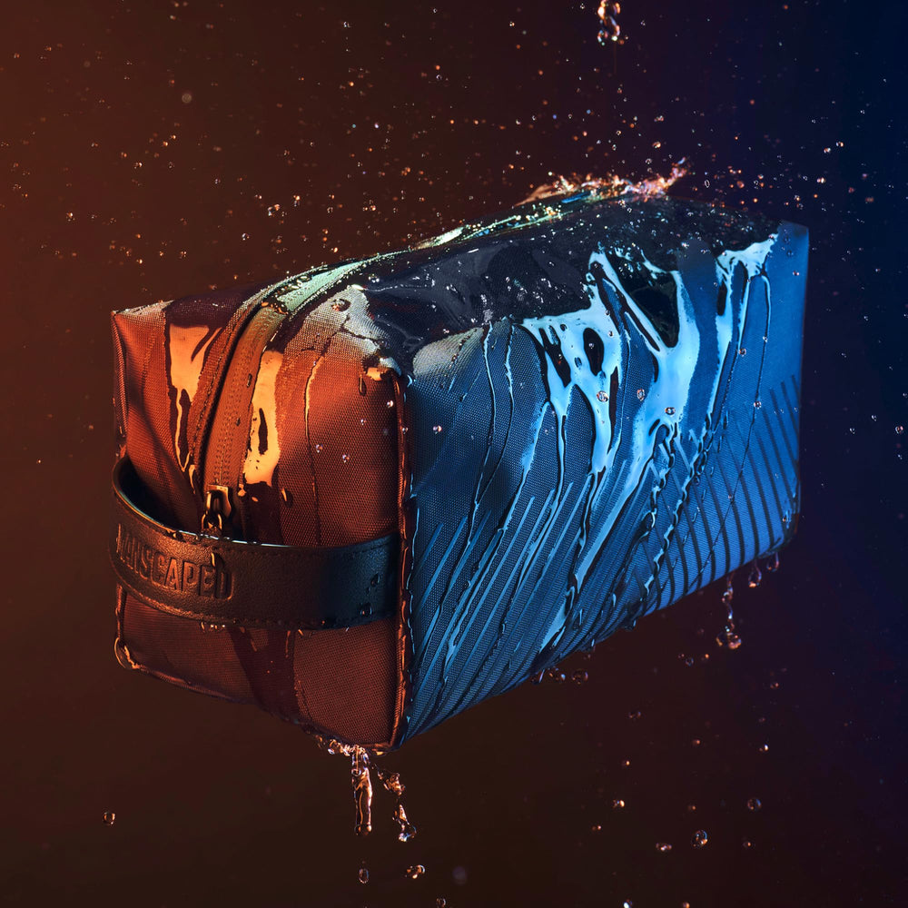 MANSCAPED water-resistant fabric demo protecting contents from spills benefit
