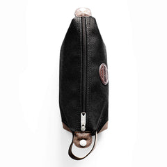 MANSCAPED close-up of heavy-duty zipper and stitching — durable travel-ready construction