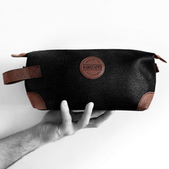 MANSCAPED bag holding a trimmer and razor neatly — convenient grab-and-go storage