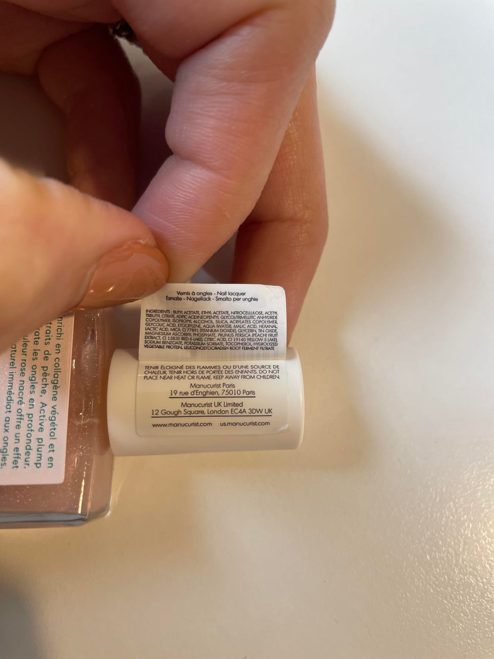 Manucurist application step on nail showing one-coat natural finish and speed