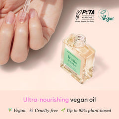 Manucurist Green Oil dropper releasing a nourishing drop for precise application