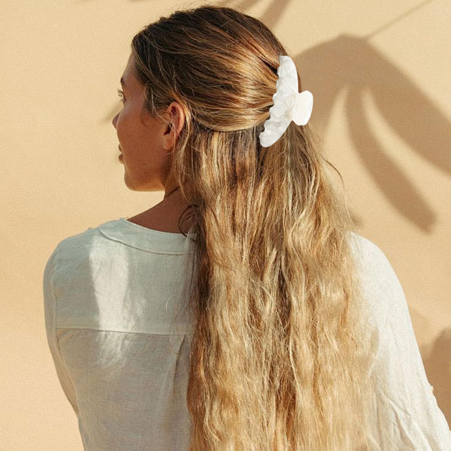MAORULU lifestyle outfit accessory shot pairs clip with elegant wardrobe