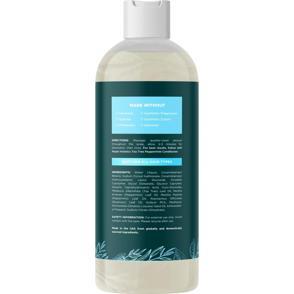 Maple Holistics bottle in shower with mint leaves conveying cooling freshness