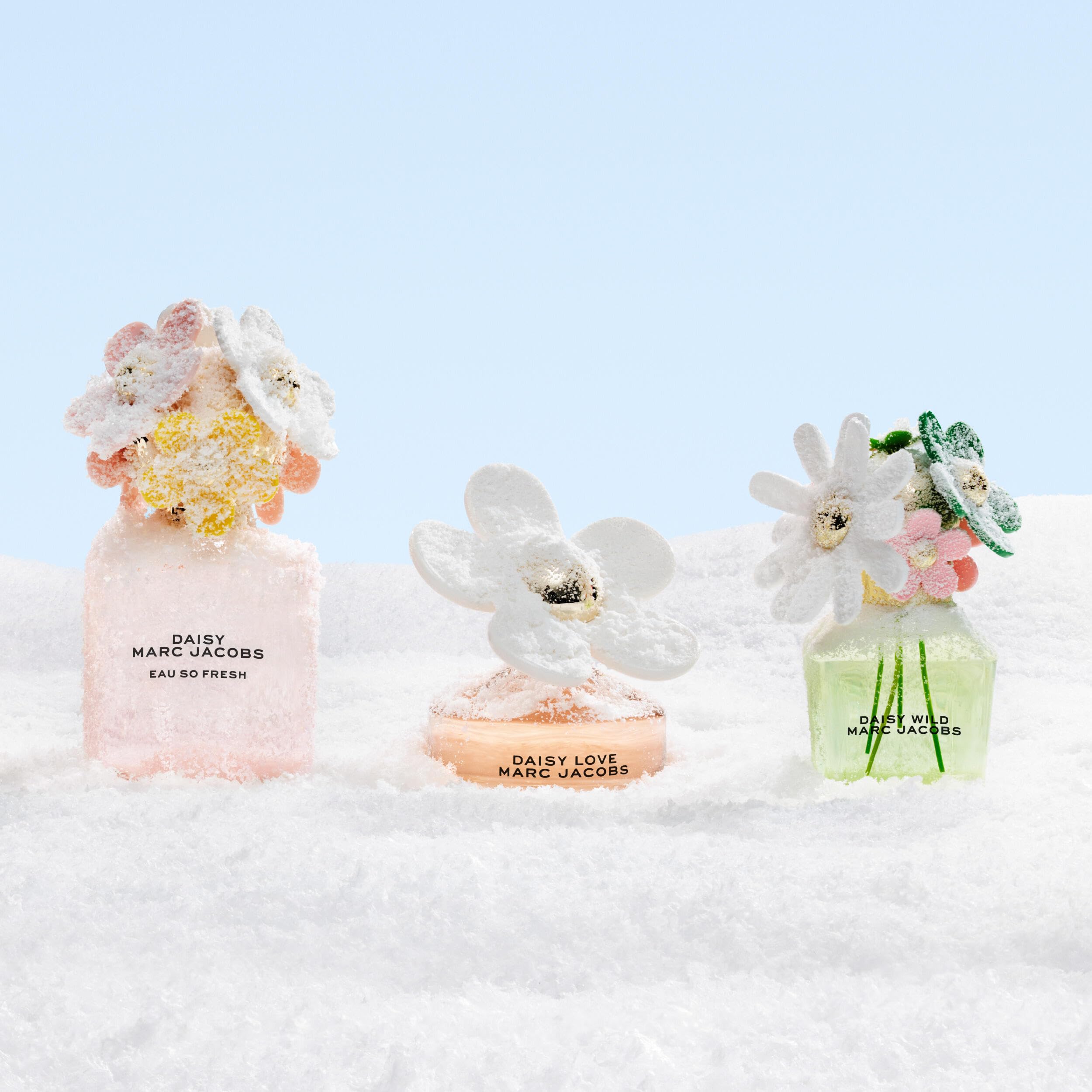 Marc Jacobs travel-size bottle inside purse demonstrating portable fragrance convenience