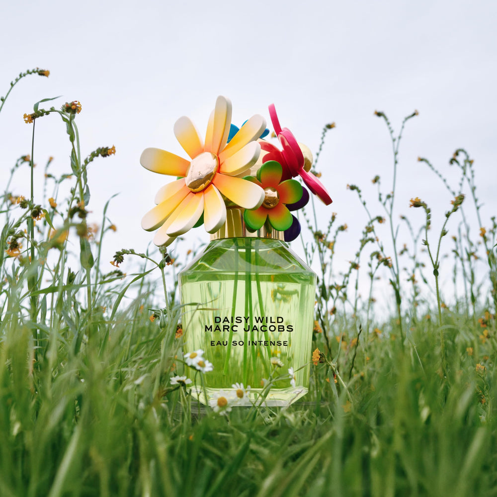 Marc Jacobs bottle held in hand illustrating travel-friendly convenience