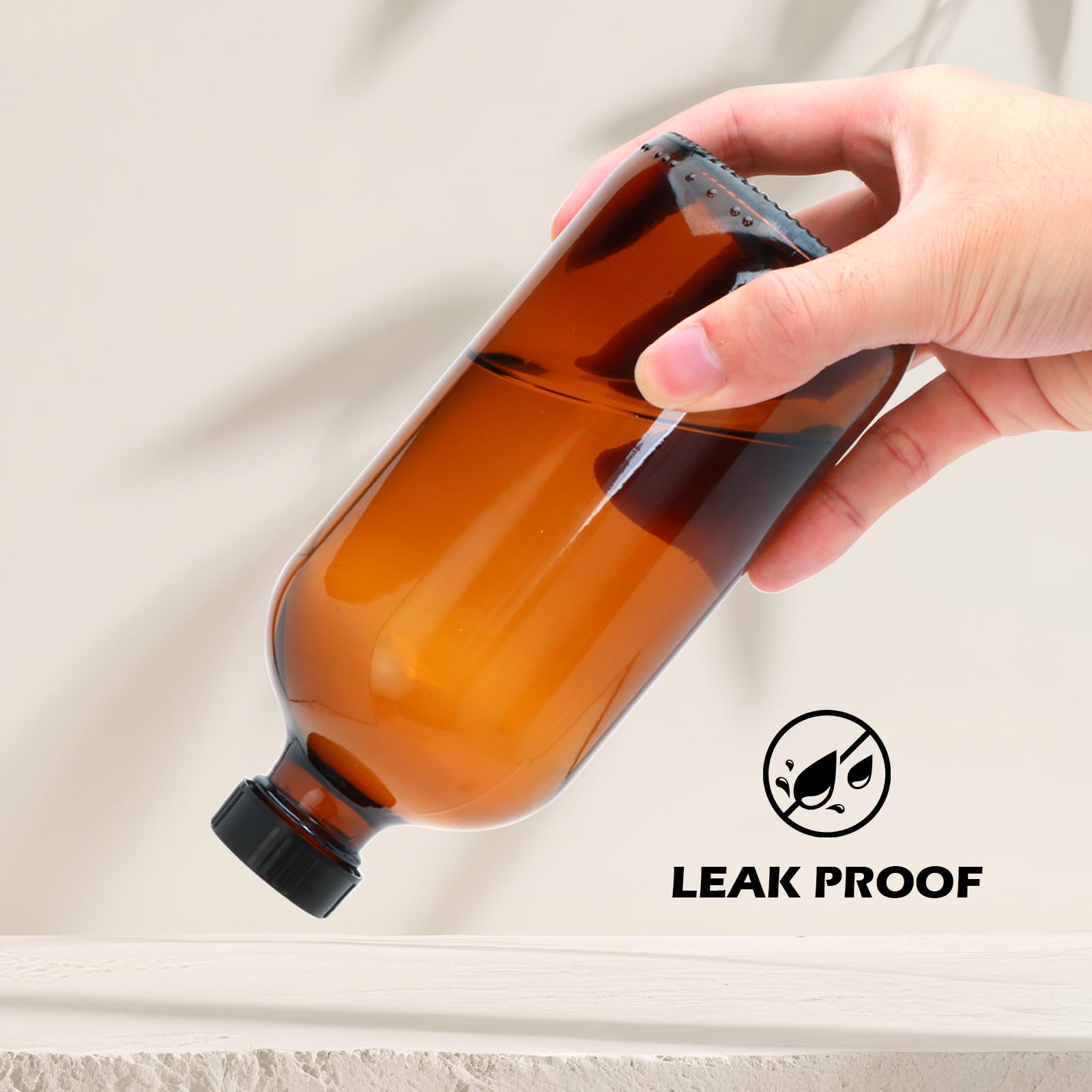 Maredash bottle held in hand for scale to show true 16oz capacity