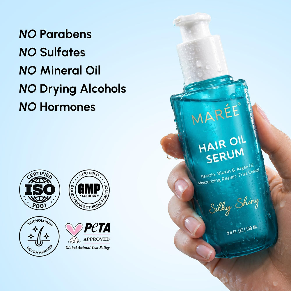 MAREE bottle held in hand to show size and easy portability