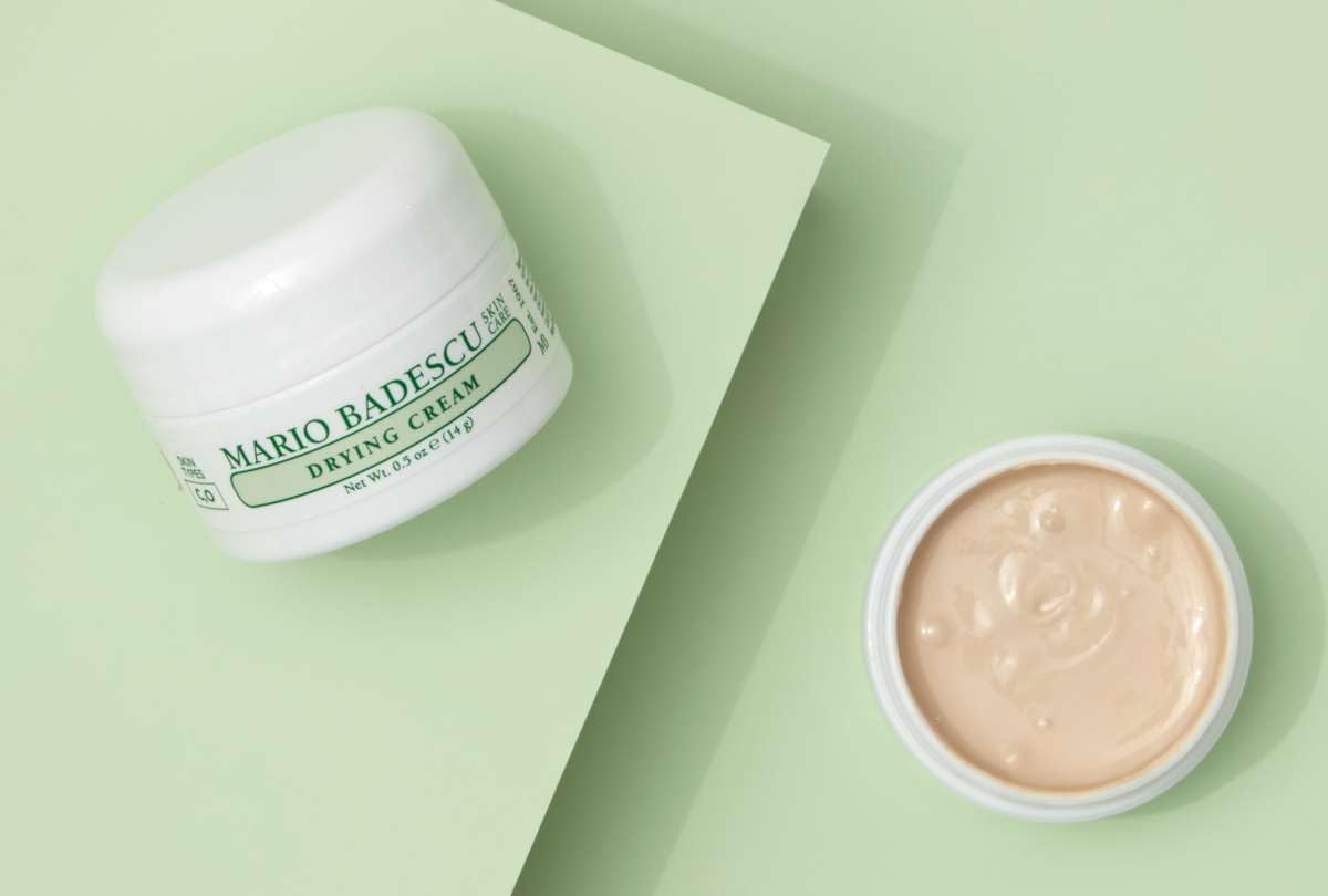 Mario Badescu drying cream on nightstand showing overnight spot-care convenience