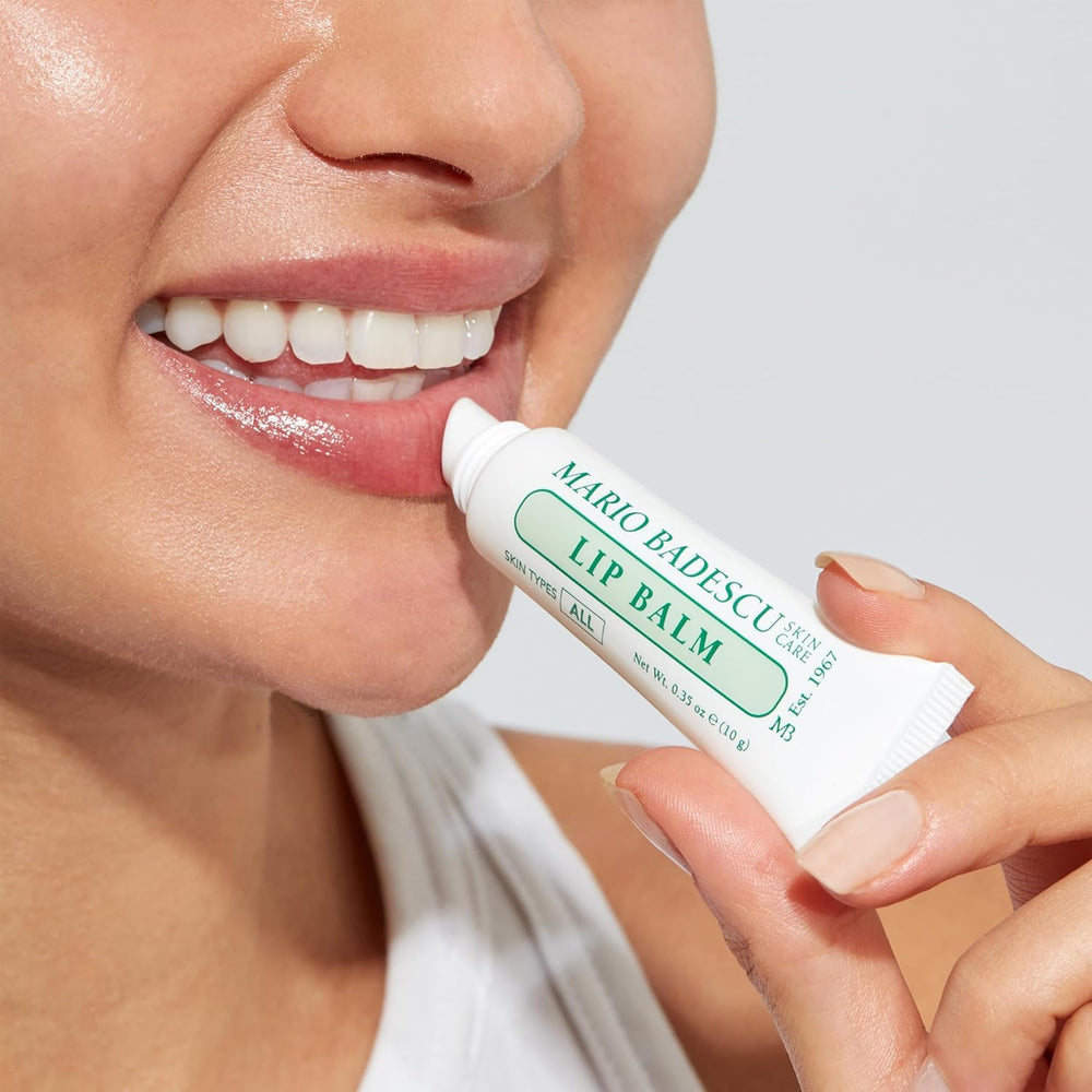 Mario Badescu tube in hand to show size and travel-friendly convenience