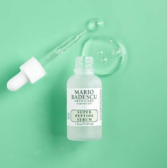 Mario Badescu dropper releasing serum, highlighting lightweight absorbency