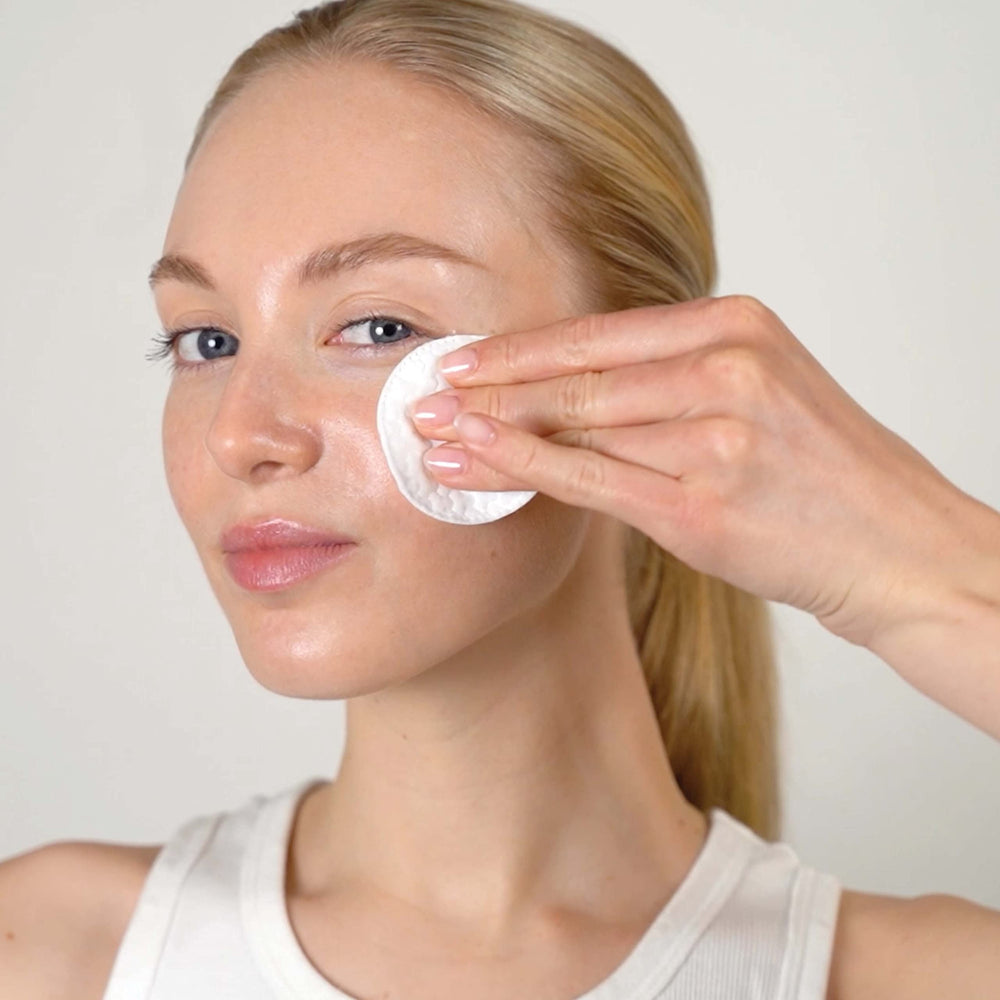 Mario Badescu toner pouring to show lightweight texture and gentle exfoliation benefit