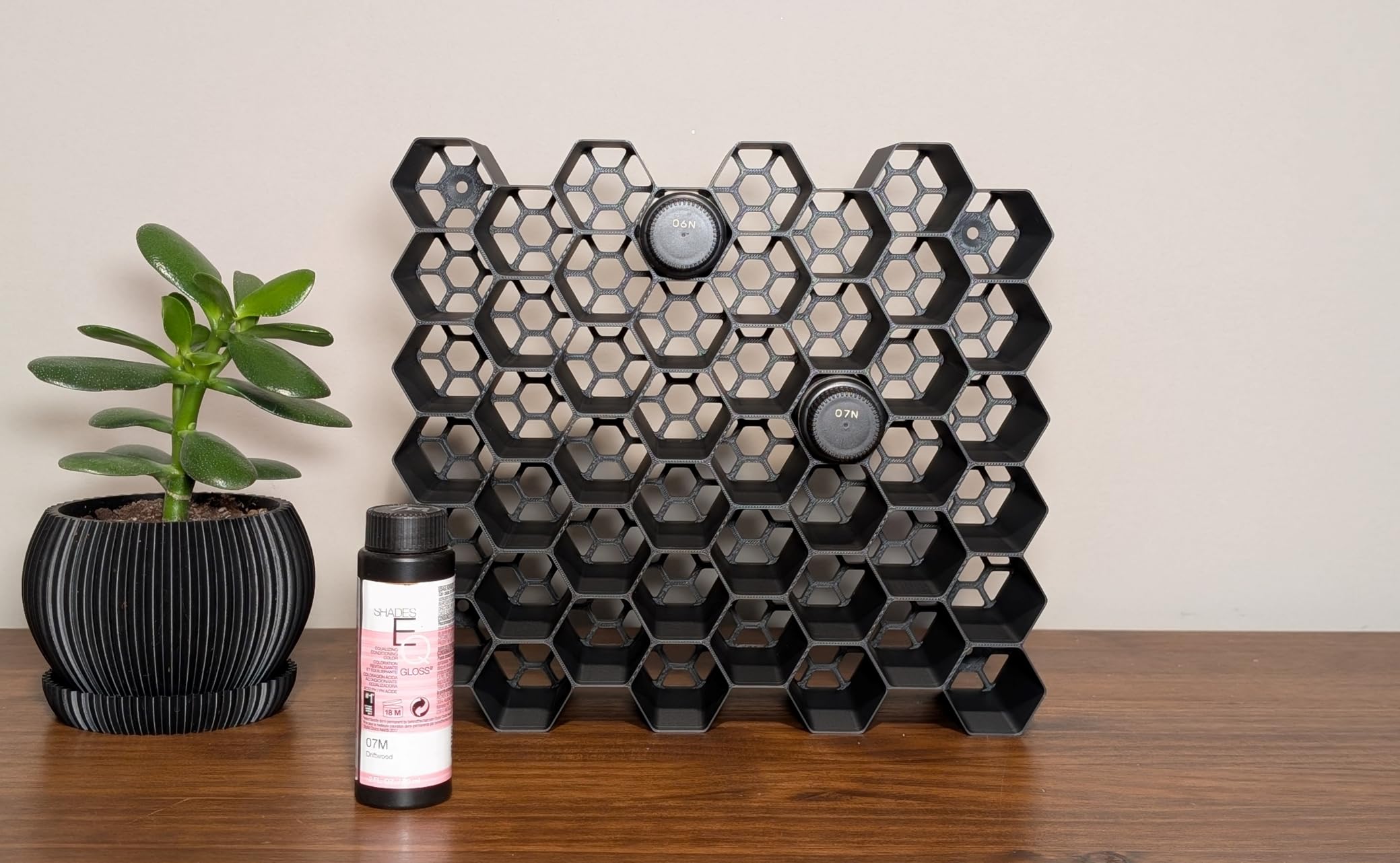 Markvicka Designs front view of hexagon organizer showing neat bottle display and quick access
