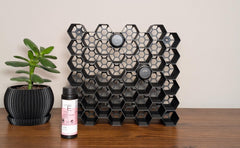 Markvicka Designs front view of hexagon organizer showing neat bottle display and quick access