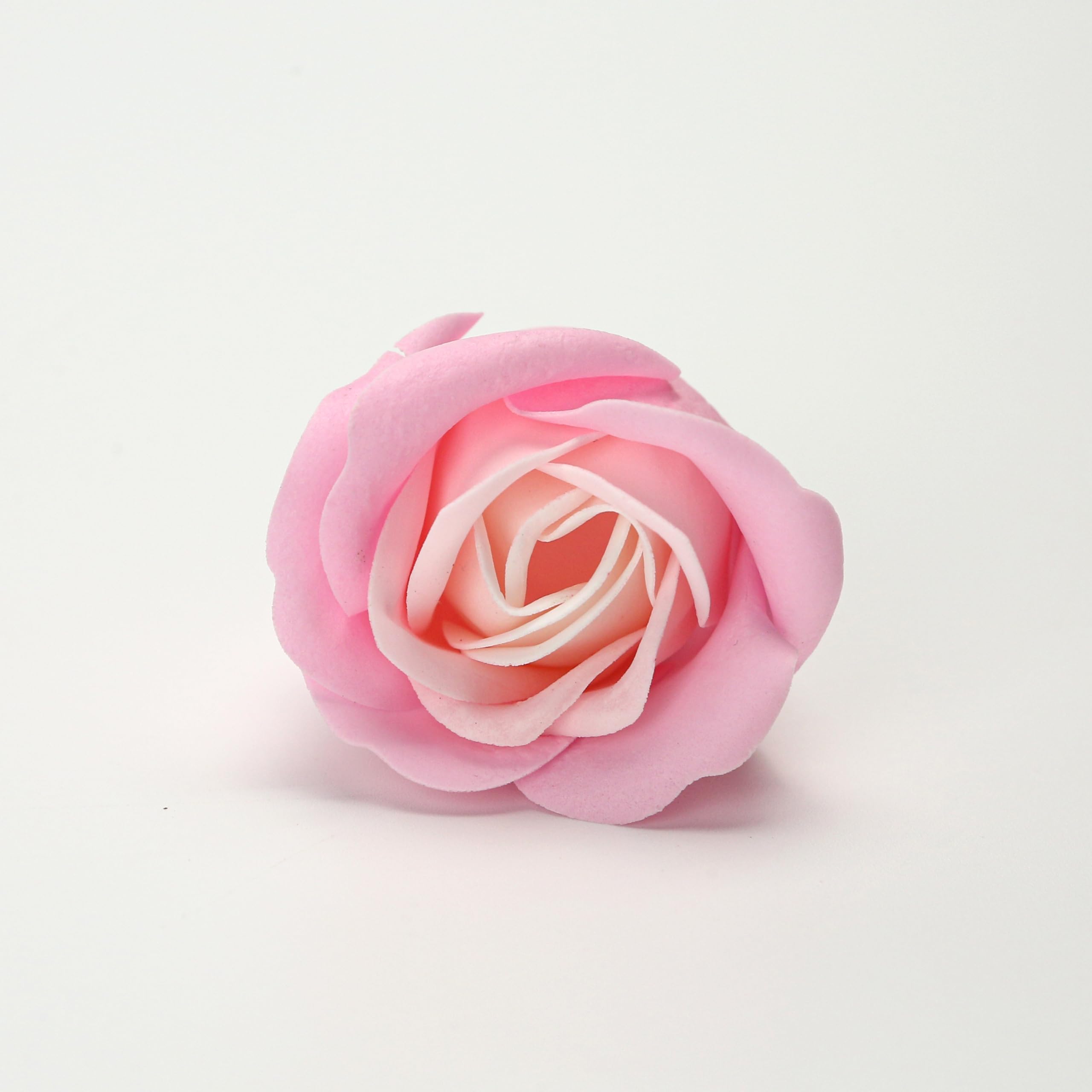 Marsrut lifestyle shot with candle and roses, adds romantic scented atmosphere