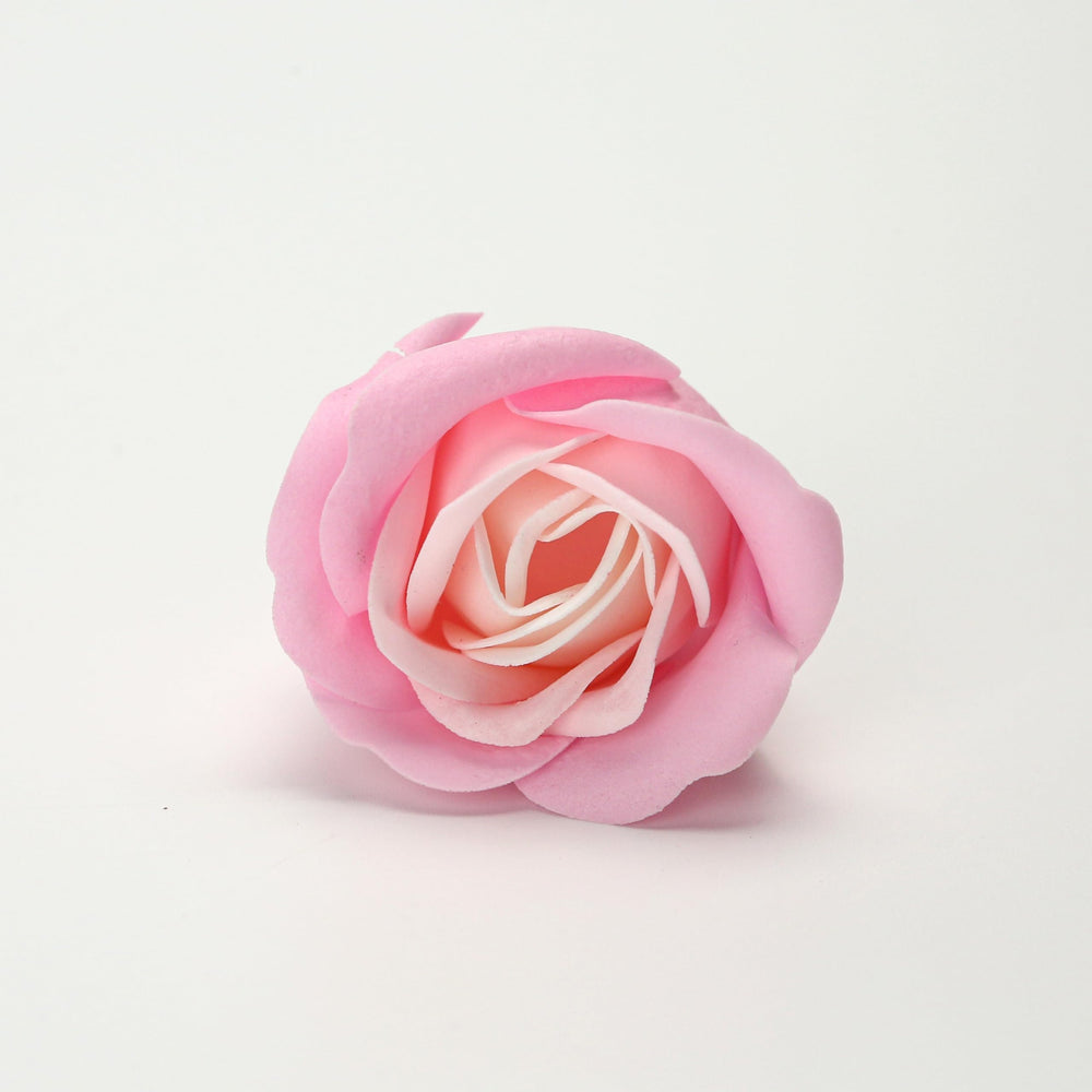 Marsrut lifestyle shot with candle and roses, adds romantic scented atmosphere