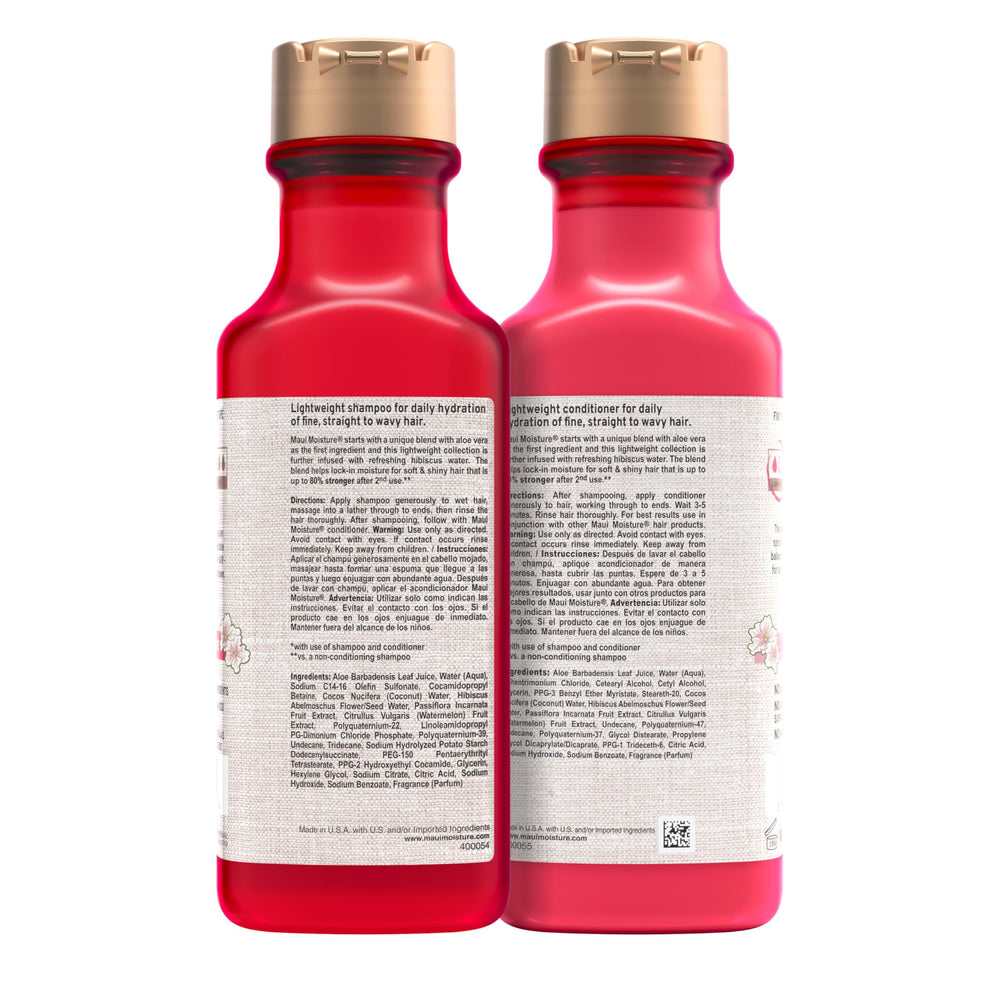 Maui Moisture bottle next to hand to show true size and portability