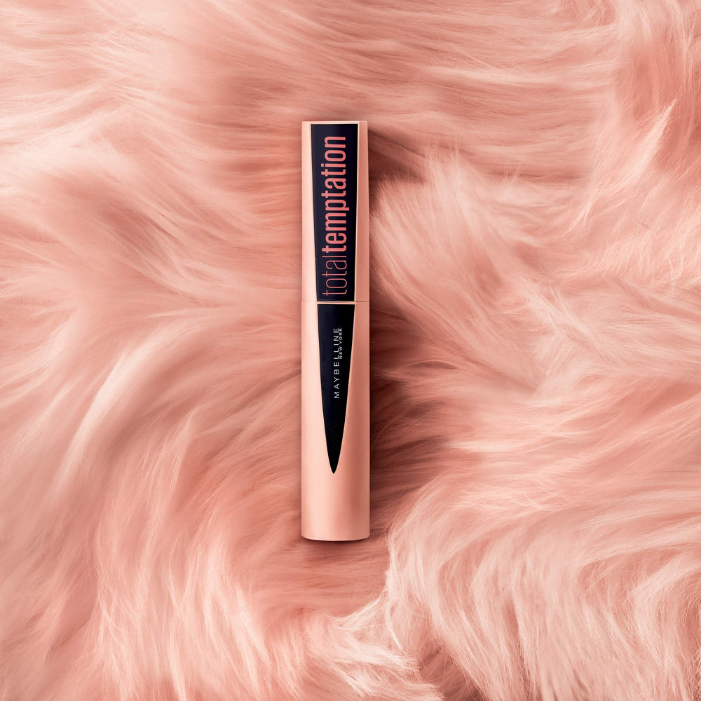 Maybelline Total Temptation next to ruler to display 0.27 fl oz compact size advantage