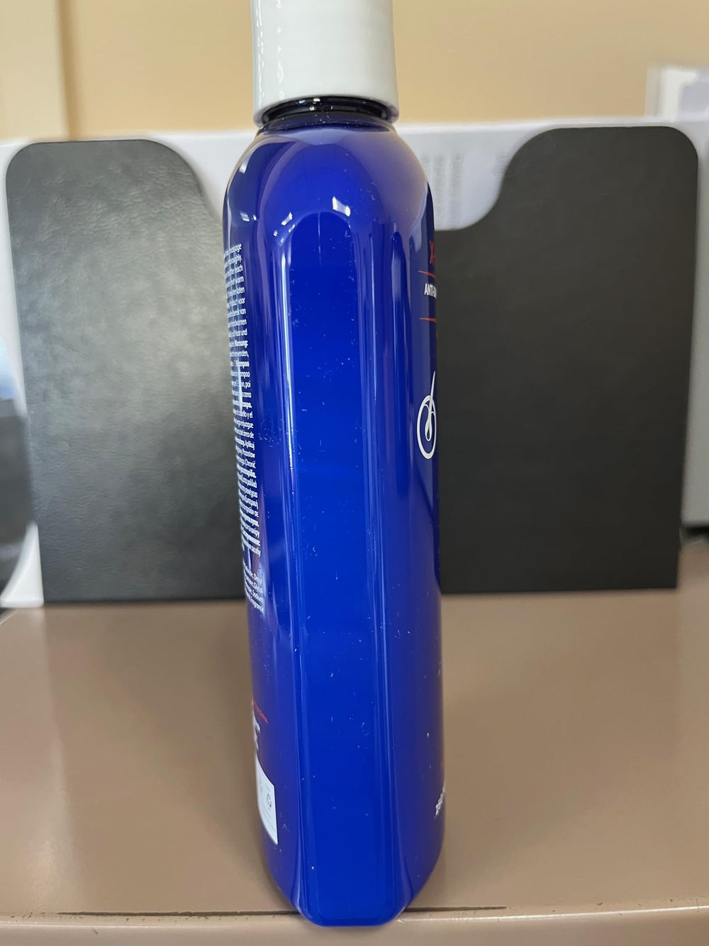 Mediceuticals 250ml bottle next to ruler for accurate size and travel-friendly benefit