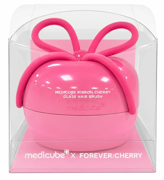 medicube brush beside a coin showing compact scale for easy pocket carrying