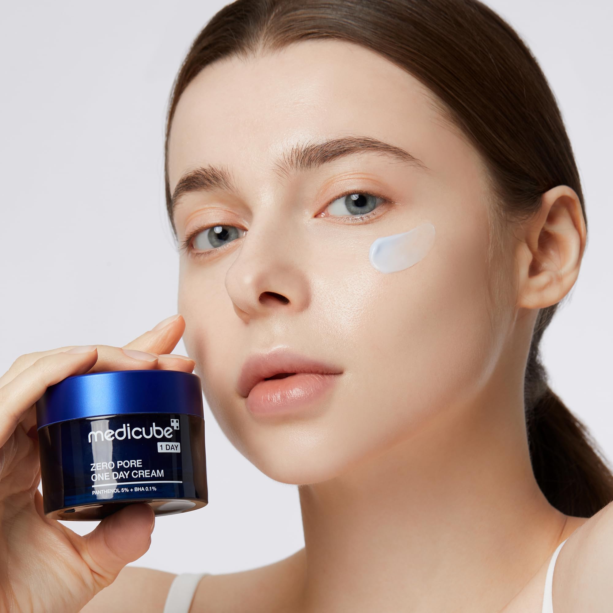 medicube open cap revealing product consistency for fast absorption benefit