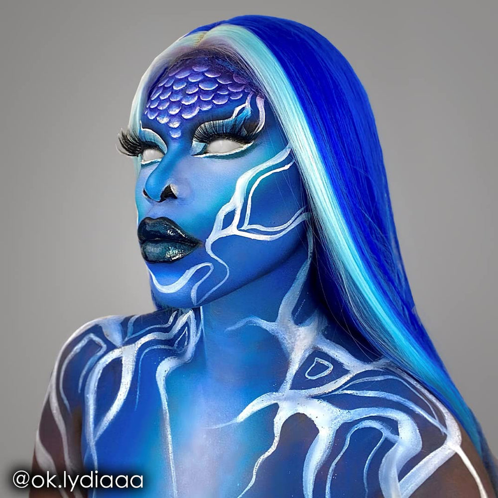 Mehron Makeup swatch applied on arm demonstrating strong blue coverage and layerability