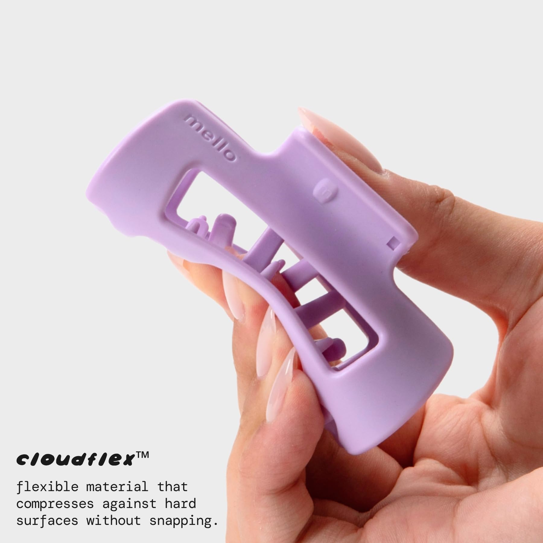 MELLO close-up of inward-curving teeth highlighting gentler pressure and secure hold
