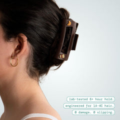 MELLO side profile in hand demonstrating flexible, unsnappable material