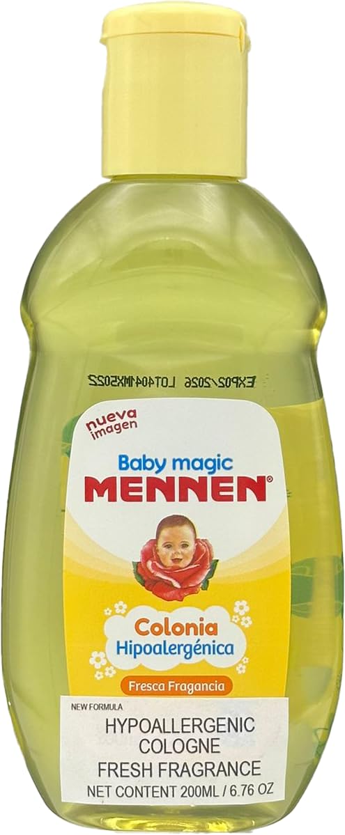 Mennen Baby Magic bottle beside a ruler demonstrating compact size for travel and on-the-go use