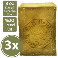 Merlinera Aleppo soap cut section revealing green interior and brown rind, shows origin