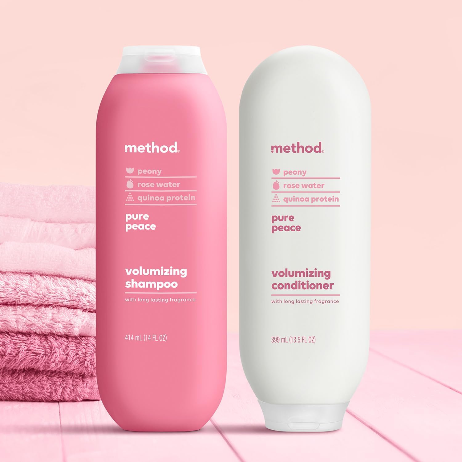 Two Method bottles in hand for scale showing generous sizes and sustainable design