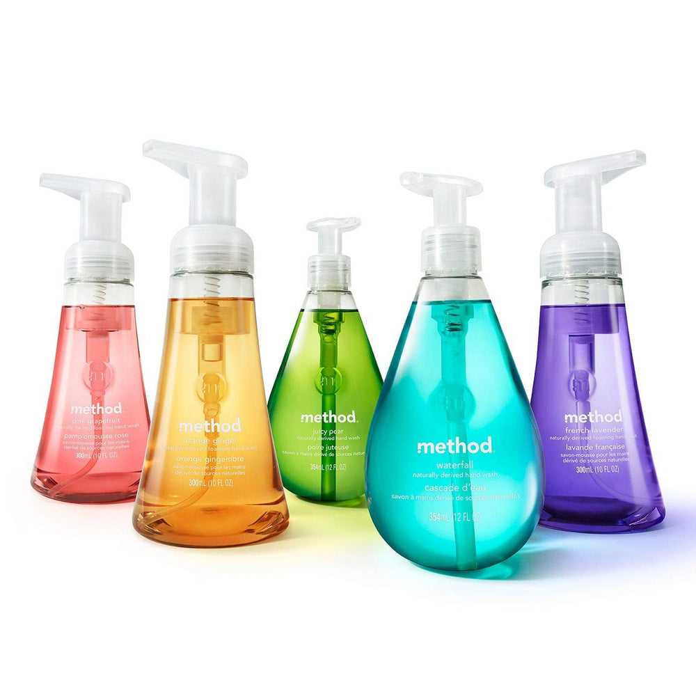 Method Sweet Water pouch next to a hand to show 34 fl oz scale