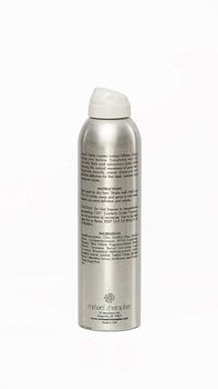Michael Christopher spraying product demonstrating instant lift benefit