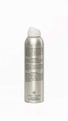 Michael Christopher spraying product demonstrating instant lift benefit