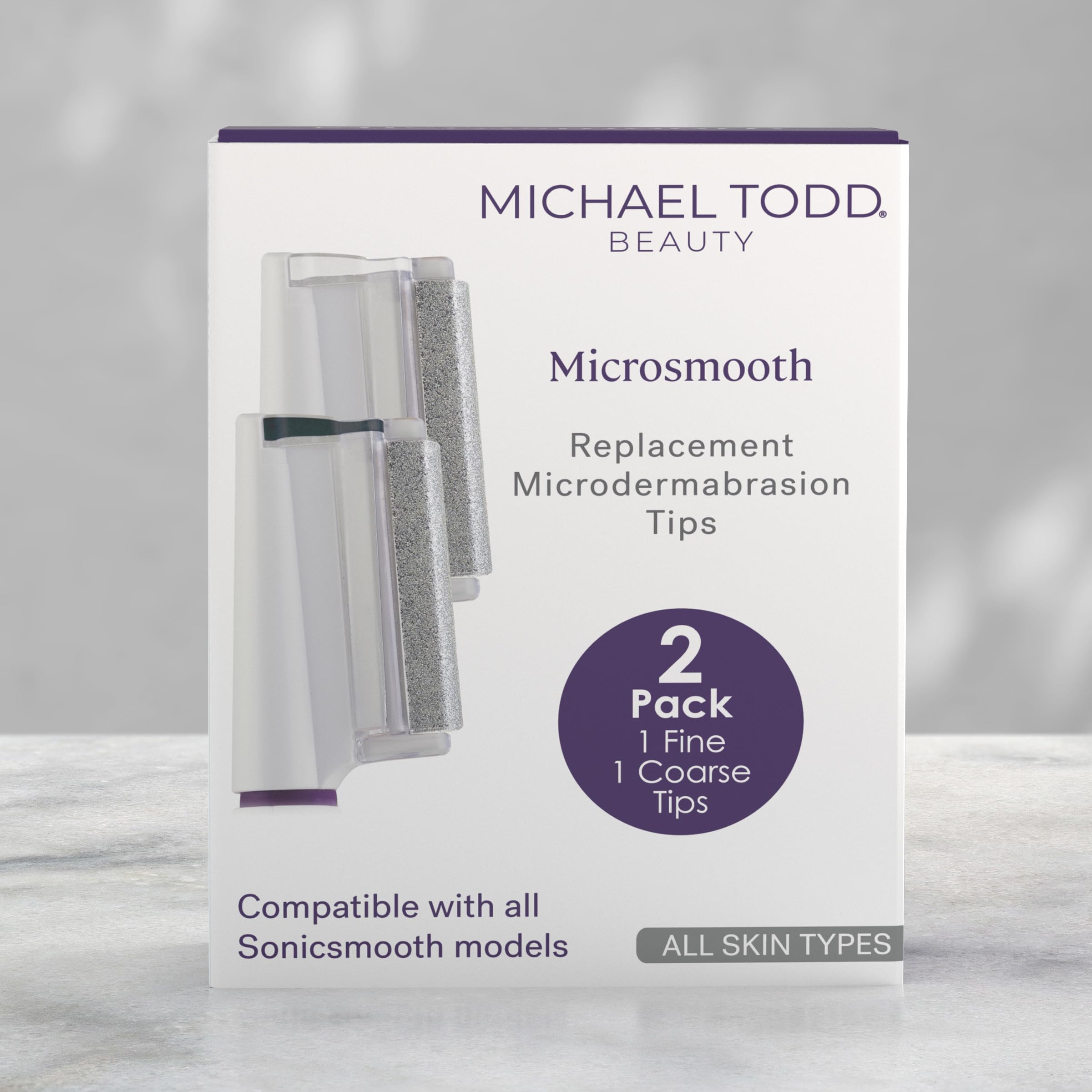 MICHAEL TODD tip next to coin showing compact size and travel convenience
