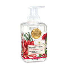 Michel Design Works bottle front packaging shows festive floral design and convenient pump for gifting