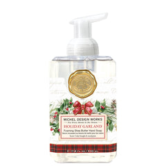 Michel Design Works square pump bottle front view showing festive label and easy dispensing