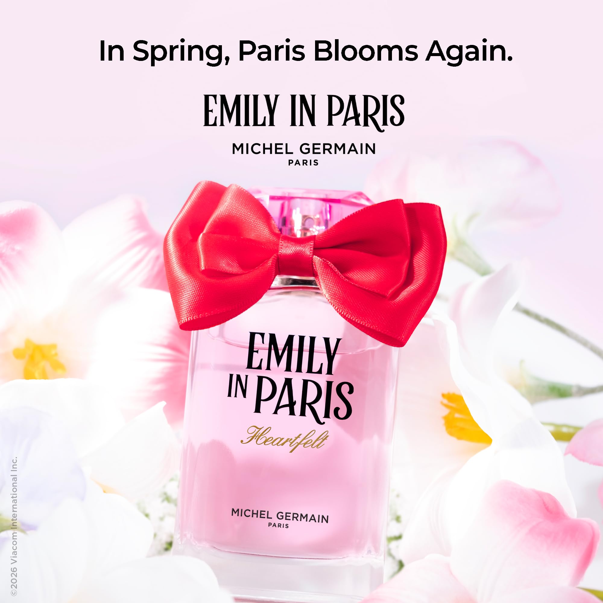 Michel Germain perfume staged on Paris street scene conveying romantic mood benefit: Parisian-inspired aura