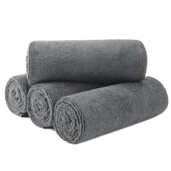 MICROFI front view of four gray towels showing compact salon pack and convenience