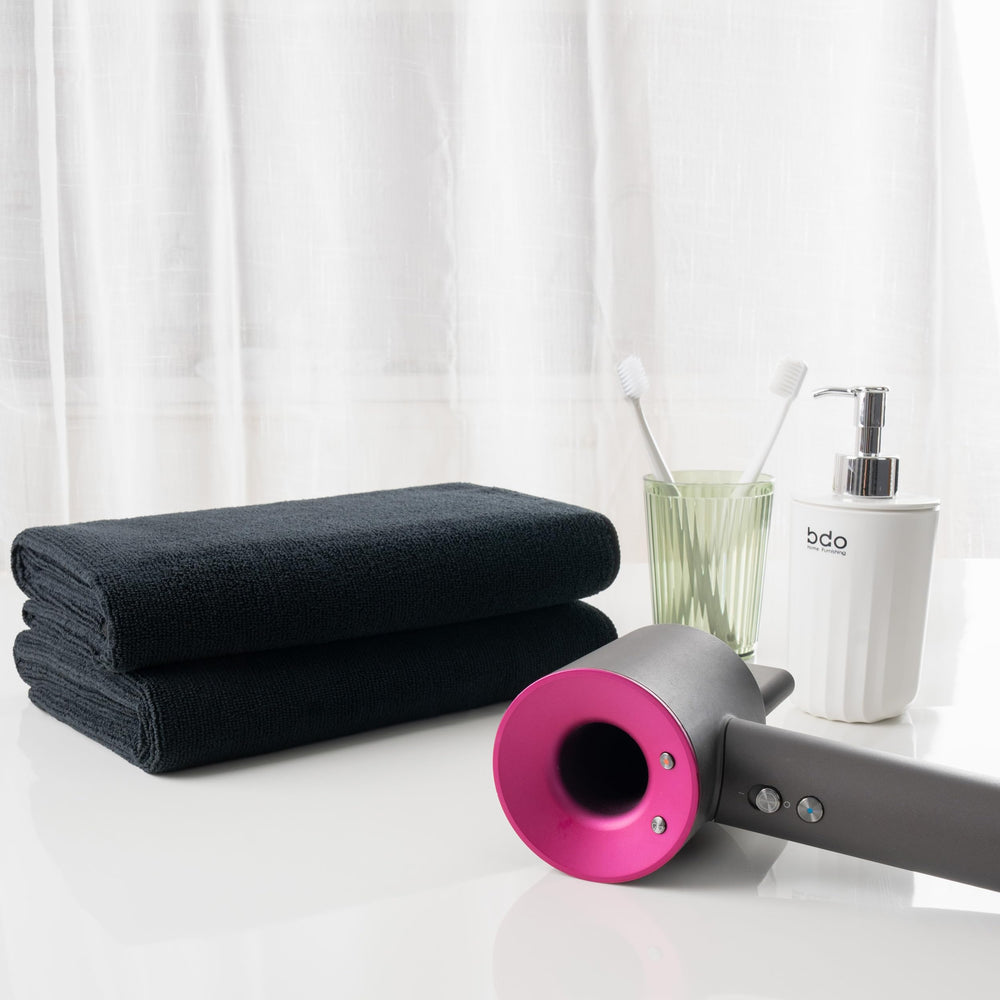 MICROFI towels displayed on counter showing generous size and convenient storage