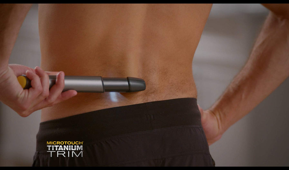 Microtouch used as precision trimmer shaping sideburns and beard edges cleanly