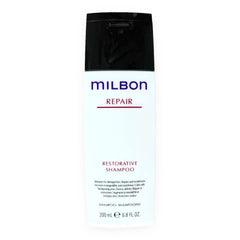 Milbon creamy lather texture on hand, shows nourishing formula action