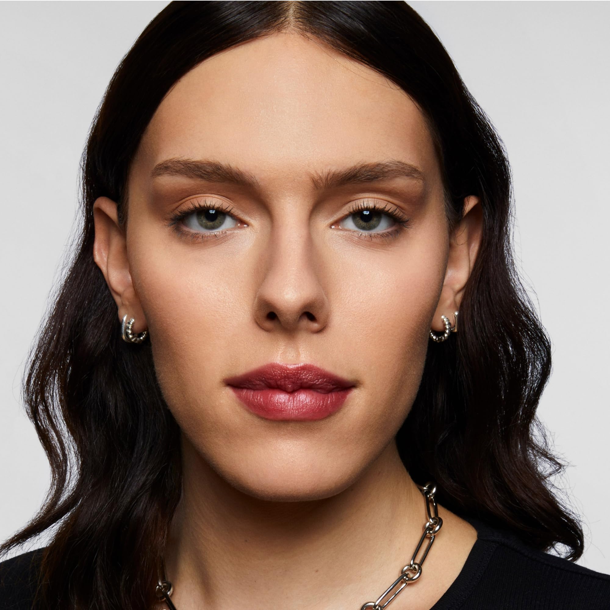 Milk Makeup spray styled on dresser conveying lifestyle convenience and daily use