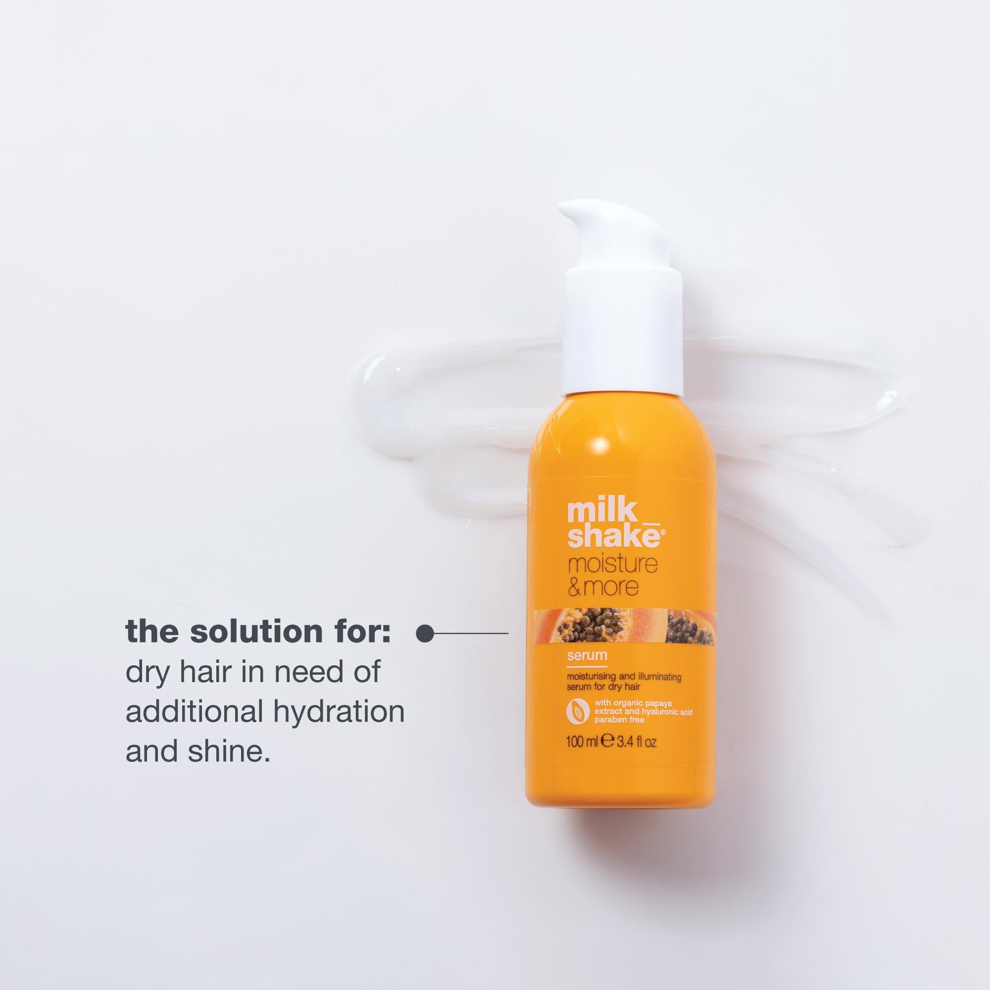 milk_shake hand applying serum to hair for smoother, frizz-free styling