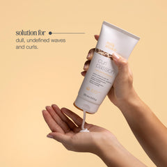 milk_shake applying cream to damp hair demonstrating even coverage and improved manageability