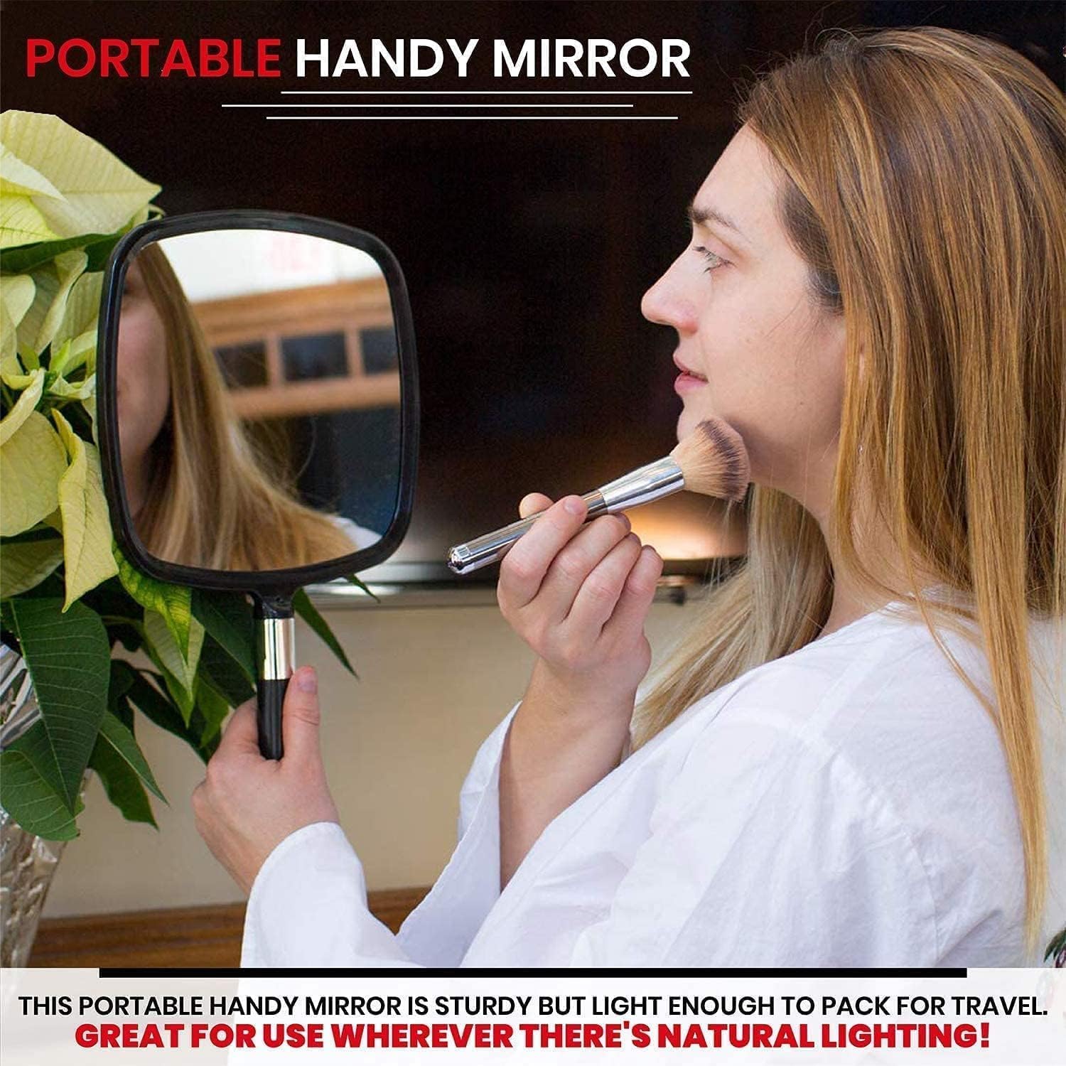 MIRRORVANA mirror held in hand showing size and comfortable balance