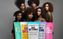Applying Miss Jessie's Curly Pudding to damp curls for defined results