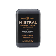 Mistral soap front packaging showing elegant bottle look and bold amber scent benefit